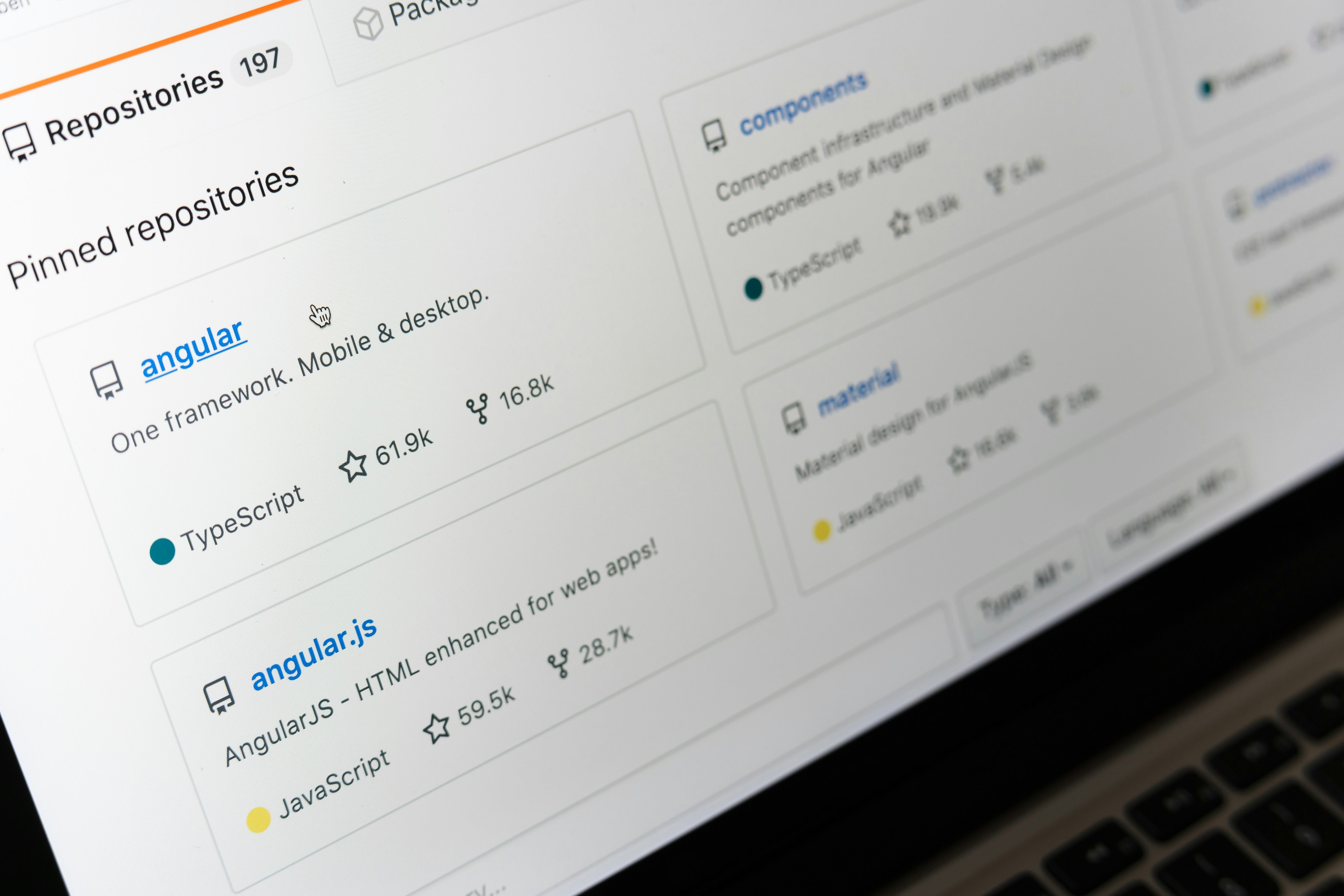 Close-up of display screen showing GitHub repositories